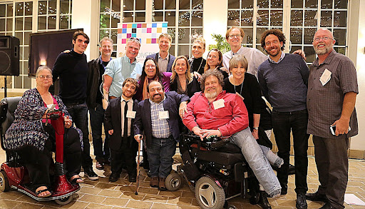 Team from CBS hosted LCA Summit. First row: Barbara Butz, Nic Novicki, Danny Woodburn and Jim LeBrecht. Second row: Tari Hartman Squire, Charmaine Hlibok, Emma Montana McElroy and Gail Ford Williamson. Third row: RJ Mitte, David Zimmerman, John Lawson, Derek Shields, Jo-Ann Dean, Michael Kaufer, David Kurs and Steve Allen.